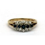 A 9ct gold sapphire and white stone ring. Approx UK size L