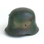 A repainted WWI German helmet, no liner.
