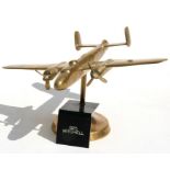 A brass model of the WW2 medium bomber the North American B-25 Mitchell with spinning propellers