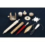 A group of 19th century Canton Export ivory sewing tools to include a sewing clamp and bodkin