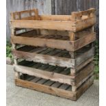 Five wooden apple crates.