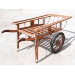 A hand painted two-wheeled hand cart, 153cms (60ins) long.