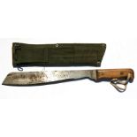 A 1985 dated British Army Martindale machette in its canvas scabbard. Blade length 33cms (13ins)