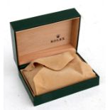 A green leather watch box marked Rolex, 15cm (6ins) wide.