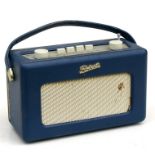 A blue Roberts Revival radio.