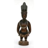 African/tribal art. A Nigerian Yoruba male Ibeji twin figure with glass and coconut shell beads. .