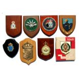 Eight military wall plaques or shields including 617 Squadron Royal Air Force, Explosive Ordnance