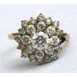 A 9ct gold cluster ring. Approx UK size N