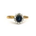 An 18ct gold diamond and sapphire ring Approx UK size P