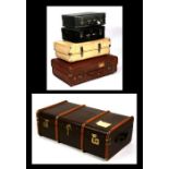 A canvas and wooden travel trunk together with four vintage suitcases (5)