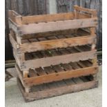 Five wooden apple crates.