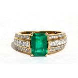An 18ct gold Colombian emerald and diamond ring, (emerald approx 2.31ct), approx UK size N