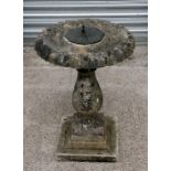 A reconstituted stone sundial bird bath, 68cms (26.5ins) high.