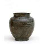 A Chinese bronze vase engraved with phoenix and flowers, seven character mark to underside, 13cms (