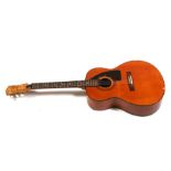 An Eko six-string acoustic guitar.