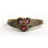 A 12ct gold & ruby dress ring (repairs), approx UK size K