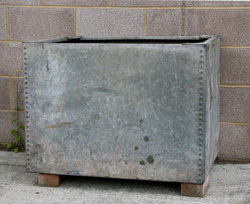 A large rectangular galvanised planter, 95cms (37.5ins) wide.