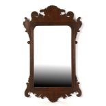 A mahogany Swansea type wall mirror, 39cms (15.25ins) wide.