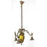 A gilt metal and glass three-armed ceiling light.
