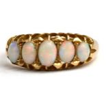 An 18ct gold five-stone opal ring, approx UK size 'P'.