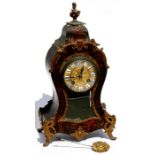 A 19th century French boulle work mantle clock, the gilt metal dial with enamel Roman numerals,
