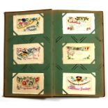An album of 50 WW1 silk postcards