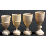 Four 18th / 19th century ivory goblets, 6cms (2.25ins) high (4).