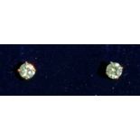 A pair of 9ct gold green Namibian demantoid stud earrings.