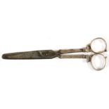 A pair of Charles I silver mounted scissors with later steel fittings (a similar pair sold by