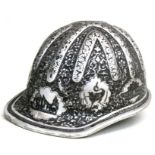A BF McDonald oil rig worker's hard hat, highly decorated in the Persian influence.