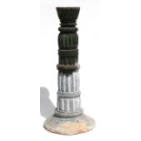 A Middle Eastern / Islamic painted pottery torch stand, 66cms (26ins) high.