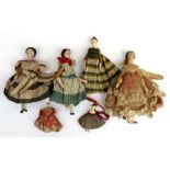 A group of six Victorian peg dolls, all in original costume, the largest 11cms 4.25ins) high.