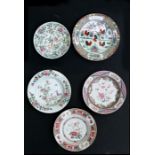 An 18th century Chinese famille rose plate decorated flowers, together with four other Chinese