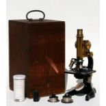An Ernst Leitz Wetzlar lacquered brass & steel microscope, numbered 19447, in original box with