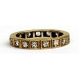 A 9ct gold eternity ring, approx UK size 'K'.