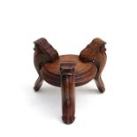 A Chinese tripod hardwood bowl or censer stand, 22cms (8.7ins) wide.Condition Report 18cms (7.