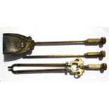 A set of three heavy brass fire irons.
