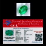 A natural emerald loose gemstone with GGL certificate report stating the emerald to be 7.25cts, oval