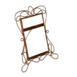 An Art Nouveau copper strut photograph frame.