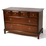 A Stag Minstrel chest with four short drawers above two long drawers, 107cms (42ins) wide.