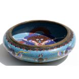 A Chinese cloisonne shallow bowl decorated with scrolling dragons chasing a flaming pearl, four