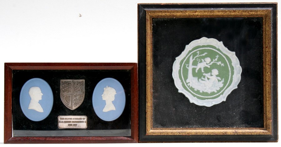 A pair of Wedgwood Jasperware Queen Elizabeth II Jubilee commemorative plaques, framed and mounted