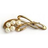 A 9ct gold pearl & diamond Art Nouveau style brooch.