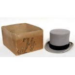 A Moore's of London grey top hat made for Ging's Theatrical Costumiers, Dublin, size 7 1/8.