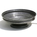 A Tudric hammered pewter footed bowl, 29cms (11.5ins) diameter