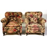A pair of Edwardian button backed armchairs.
