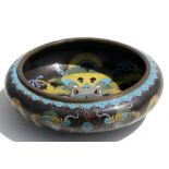 A Chinese cloisonne shallow bowl decorated with scrolling dragons chasing a flaming pearl, four