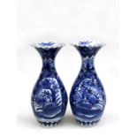 A pair of late 19th century Japanese blue & white 'frill' top vases, 32cms (12.5ins) high (2).