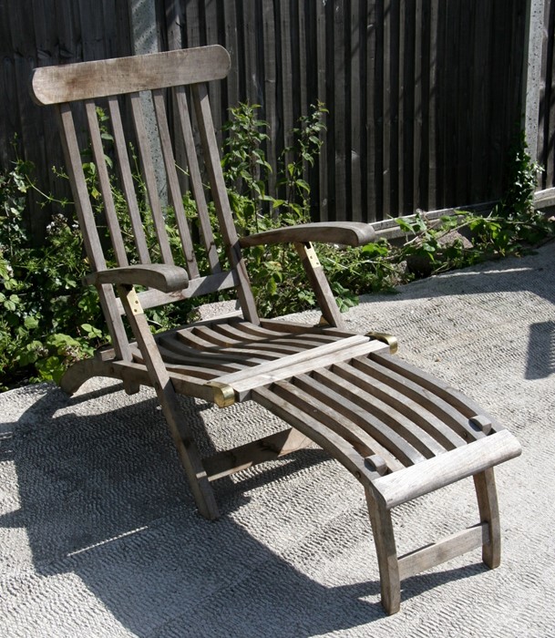 A Chic Teak plantation teak steamer chair.