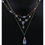 A 9ct gold moonstone necklace; together with two silver mounted examples (3).